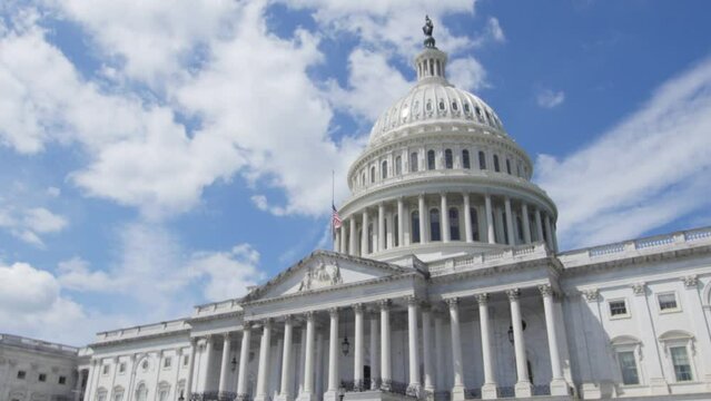 Dome of United States Capitol Building against blue sky, Washington D.C. National Mall