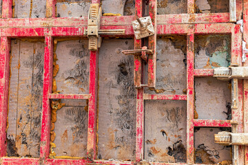 Reinforced concrete foundation of a modern monolithic residential building. Prepared formwork with reinforcing mesh for pouring concrete. Monolithic construction technologies.