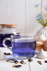 Obraz na płótnie Canvas Thai anchan blue tea in a transparent glass. A healthy drink for health, diet, detox