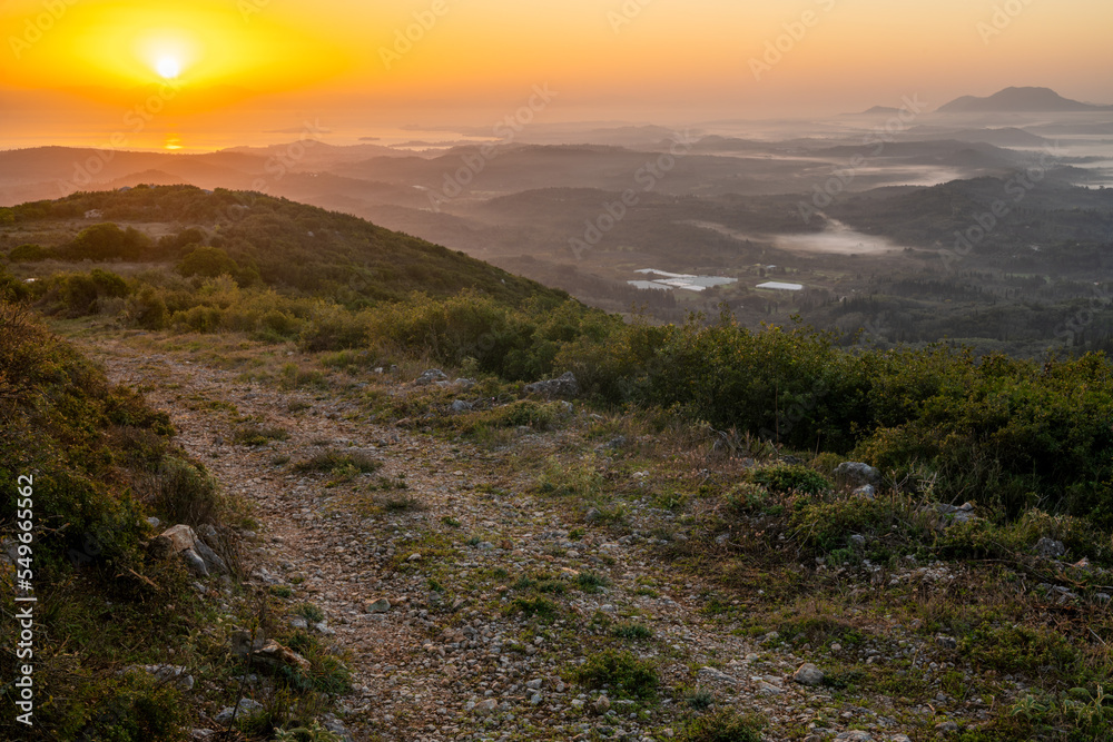 Wall mural mountain off-road during sunrise