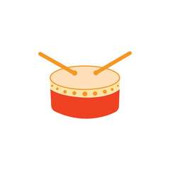 Orange drum and wooden drum sticks. Musical instrument.