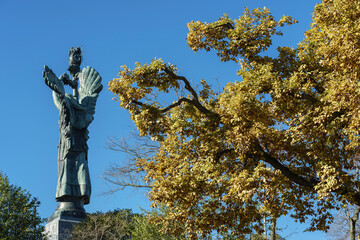 Turin, Italy - November 24, 2022: Autumn foliage in the Maddalena Park. In the background, the...