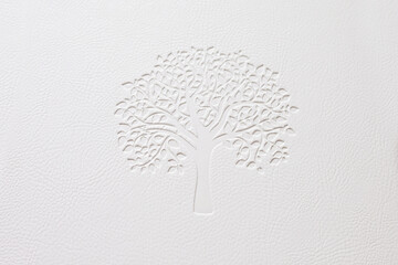 Abstract luxury  leather texture for background. White  leather with elegant tree embossing for work design or backdrop product.