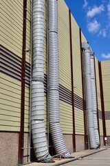 Big ventilation ducts outside a wall in Dusseldorf Messe