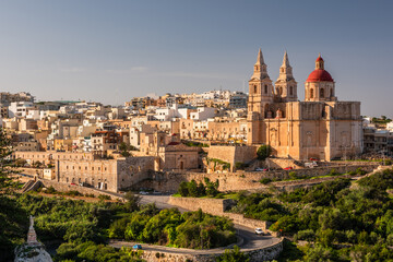 Il-Mellieha, Malta -  Mellieha town at sunny day with Paris Church on hill top - obrazy, fototapety, plakaty