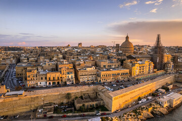 Valletta,Malta cityscape of old town at sunset, aerial drone view