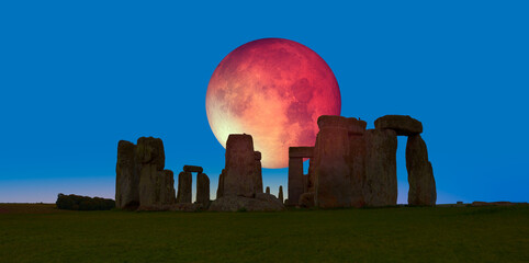 Stonehenge with lunar eclipse - United Kingdom"Elements of this image furnished by NASA"