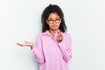 Young african american woman isolated showing that she has no money.