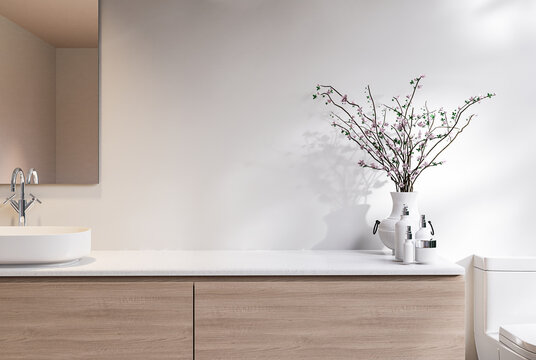 Close up view of empty minimal contemporary sink counter in the bath room for copy space 3d render There are wooden counter and white wall decorated with white plant pots and branches with flowers.