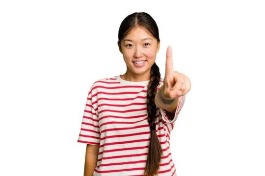 Young Asian woman isolated showing number one with finger.