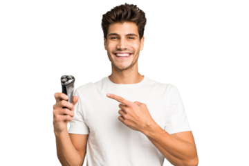 Young caucasian man holding a razor isolated smiling and pointing aside, showing something at blank space.