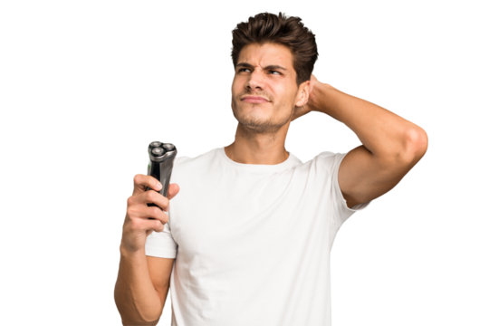 Young caucasian man holding a razor isolated touching back of head, thinking and making a choice.