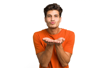 Young caucasian handsome man isolated folding lips and holding palms to send air kiss.