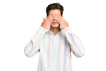Young caucasian handsome man isolated afraid covering eyes with hands.