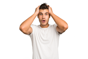 Young caucasian handsome man isolated being shocked, she has remembered important meeting.