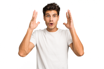 Young caucasian handsome man isolated celebrating a victory or success, he is surprised and shocked.