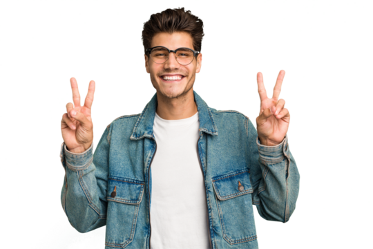 Young caucasian handsome man isolated showing victory sign and smiling broadly.