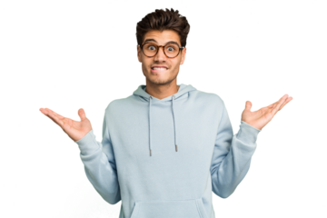 Young caucasian handsome man isolated confused and doubtful shrugging shoulders to hold a copy space.