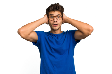 Young caucasian handsome man isolated covering ears with hands trying not to hear too loud sound.