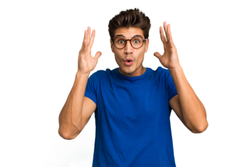 Young caucasian handsome man isolated celebrating a victory or success, he is surprised and shocked.