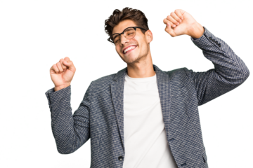 Young caucasian handsome man isolated celebrating a special day, jumps and raise arms with energy.