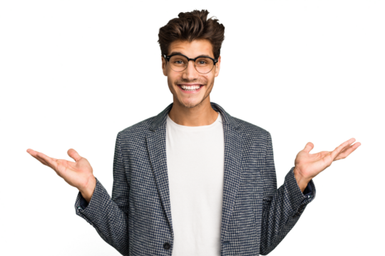 Young caucasian handsome man isolated makes scale with arms, feels happy and confident.
