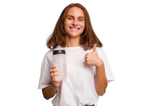 Young caucasian sport woman holding a bottle of water isolated smiling and raising thumb up