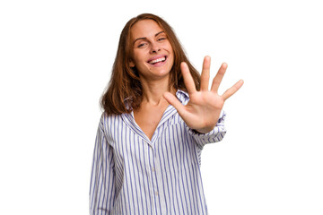 Young caucasian woman isolated smiling cheerful showing number five with fingers.