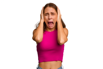 Young caucasian woman isolated covering ears with hands trying not to hear too loud sound.