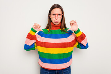 Young caucasian cute woman isolated on white background showing a dislike gesture, thumbs down....