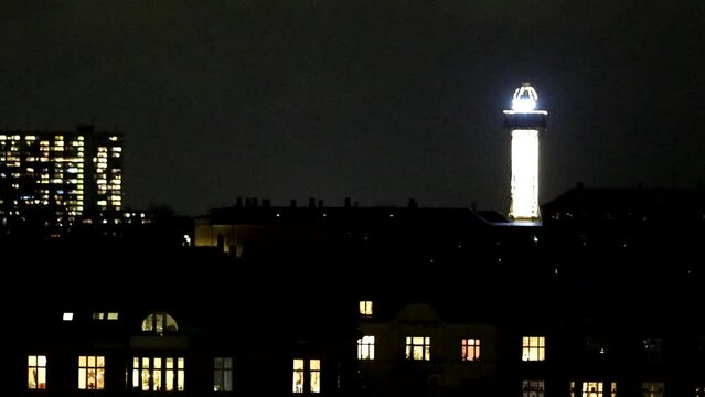 Copenhagen, Denmark The landmark zoo tower is illuminated at night. 