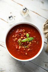 Tomato soup with pesto sauce