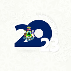 New Year 2023 for Maine on snowflake background.