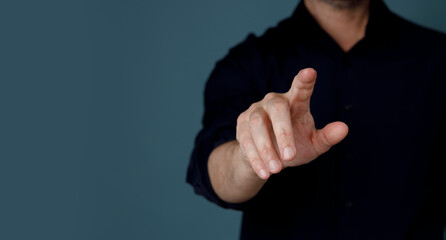 Businessman touching imaginery screen