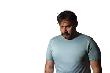 Upset and sad man posing isolated on transparent background studio portrait.