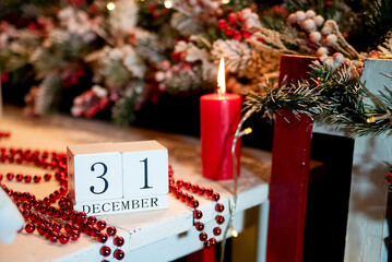 December 31 calendar on the background of a Christmas tree with decor. happy new year and christmas