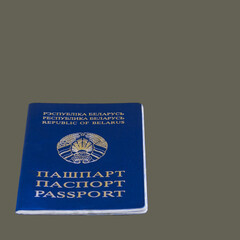 Passport of a citizen of the Republic of Belarus on a gray background with copy space to add text. The passport is an identity document.