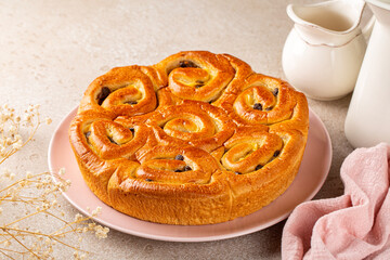 French yeast rolls or roses cake with custard pastry cream and chocolate.
