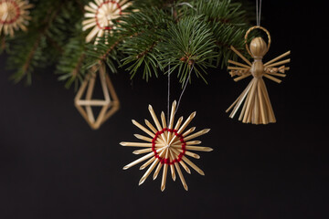 Fototapeta na wymiar Christmas decorations are made of straw. Christmas decor. Small depth of field 