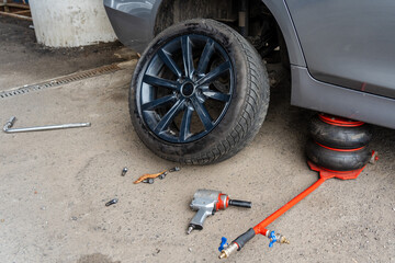 Close up of changing car tyre. Car tire fitting