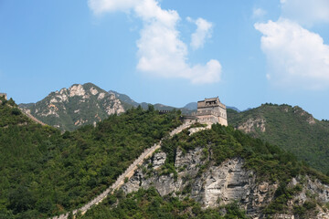 Fototapeta na wymiar one section of the Great Wall at Juyong Pass in Beijing on sunny day with blue sky white clouds