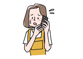 電話しながら困った顔をしている女性
