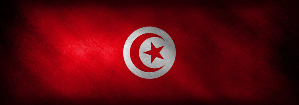 The flag of Tunisia on a retro background
