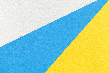 Fototapeta premium Old craft white, blue and yellow color paper background. Vintage abstract turquoise cardboard with gradient