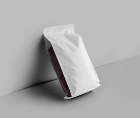 Mockup of white gusset packaging, transparent pouch with coffee beans, diagonally, isolated on wall background.