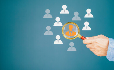 Human or HRM Resource Management, Magnifier glass focus on manager icon, one of employee icons for...