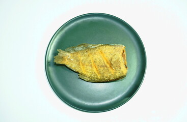 deep fried snake skin catfish or gourami on plate