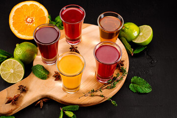 Set of different drinks on wooden desk