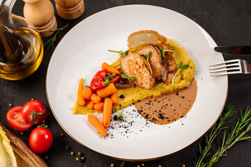 Baked potatoe with boiled vegetables on wooden background
