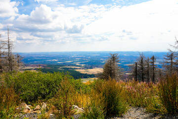 Fototapeta premium View of the surrounding landscape from the Wurmberg in the Harz mountains. 